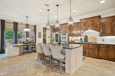Tucked away on a beautifully landscaped cul-de-sac lot in the - photo 6