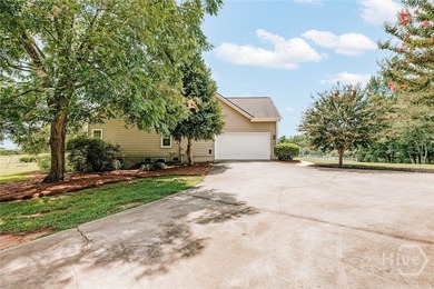 Welcome to this exceptional single-level brick home in Colbert - photo 44