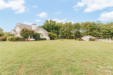 Welcome to this exceptional single-level brick home in Colbert - photo 47