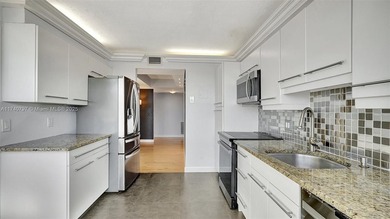 Discover this spacious corner two-bedroom, two-bath apartment