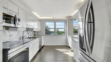 Discover this spacious corner two-bedroom, two-bath apartment