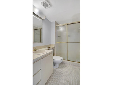 Discover this spacious corner two-bedroom, two-bath apartment