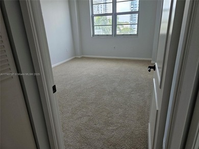 Discover this spacious corner two-bedroom, two-bath apartment
