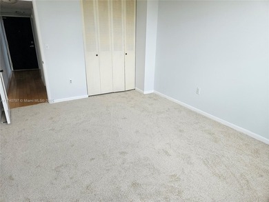 Discover this spacious corner two-bedroom, two-bath apartment