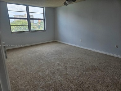 Discover this spacious corner two-bedroom, two-bath apartment