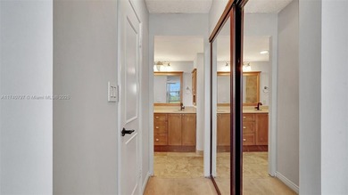 Discover this spacious corner two-bedroom, two-bath apartment