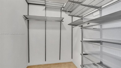 Discover this spacious corner two-bedroom, two-bath apartment