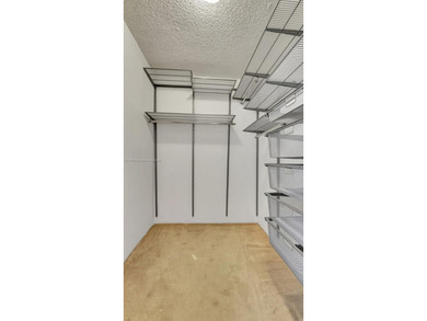 Discover this spacious corner two-bedroom, two-bath apartment