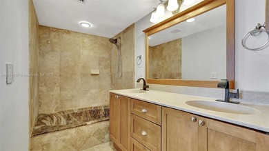 Discover this spacious corner two-bedroom, two-bath apartment