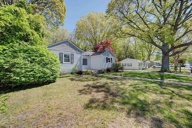 This charming 3-bedroom, 1.5-bath home sits on an oversized - photo 2