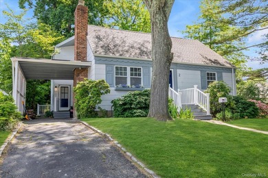 Welcome to this charming expanded 4-bedroom, 2-bath Cape nestled - photo 2