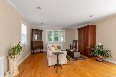 Welcome to this charming expanded 4-bedroom, 2-bath Cape nestled - photo 3