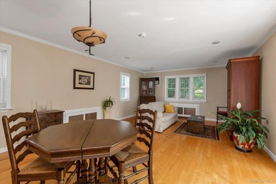 Welcome to this charming expanded 4-bedroom, 2-bath Cape nestled - photo 4