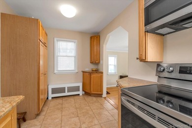Welcome to this charming expanded 4-bedroom, 2-bath Cape nestled - photo 7