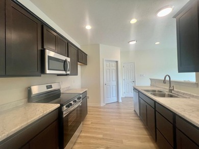 Welcome to Lakeshore Village! Under construction--This stunning - photo 9