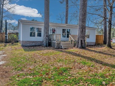 Enjoy lake view living on this rare 1.49-acre turnkey property - photo 2
