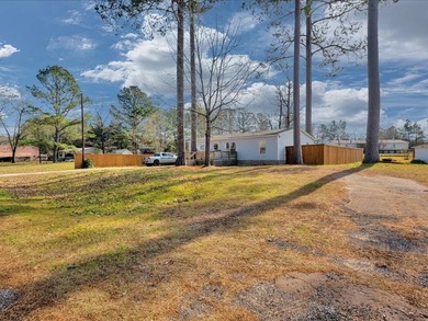 Enjoy lake view living on this rare 1.49-acre turnkey property - photo 3