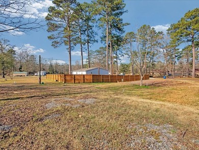 Enjoy lake view living on this rare 1.49-acre turnkey property - photo 7