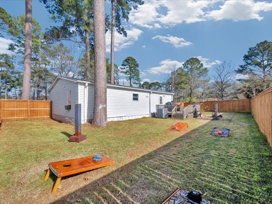 Enjoy lake view living on this rare 1.49-acre turnkey property - photo 8