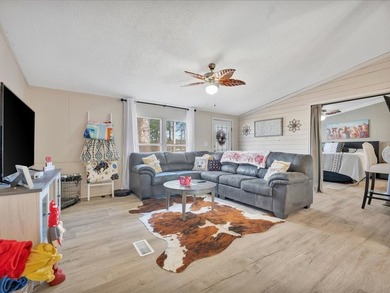 Enjoy lake view living on this rare 1.49-acre turnkey property - photo 9