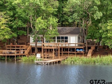 Lakeside Living on Private Lake Ioni! A Hidden Retreat is tucked - Lake Home For Sale in Elkhart, Texas