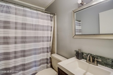 This charming Biloxi property is the perfect blend of comfort - photo 11