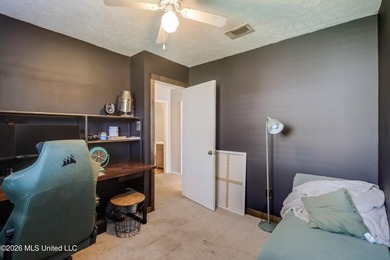 This charming Biloxi property is the perfect blend of comfort - photo 12