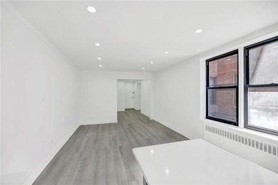 Welcome to this move-in ready first-floor studio co-op, offering - photo 13