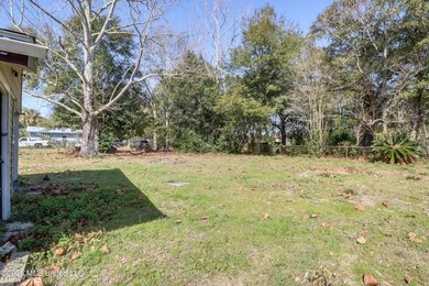 This charming Biloxi property is the perfect blend of comfort - photo 18