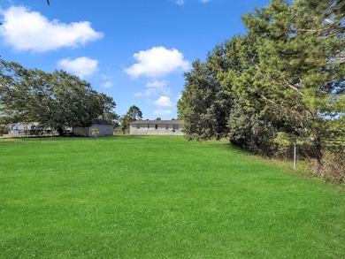 This 3 BR 2 BA home is located on one of the highest lots in the - photo 1