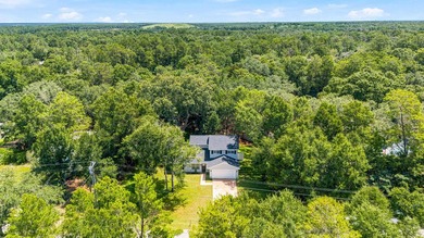 Private, well-kept 4BR/2.5BA home on a spacious lot in Magnolia - photo 2