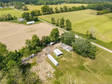 5.03 scenic acres with a pond in a tranquil setting near Madison - photo 4