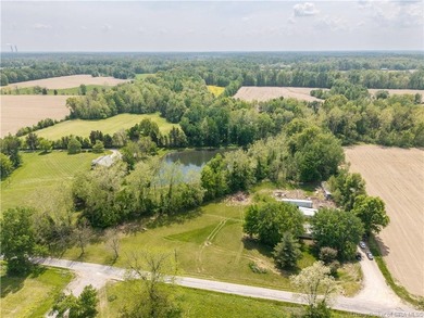 5.03 scenic acres with a pond in a tranquil setting near Madison - photo 5