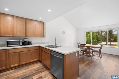 Panoramic golf-course views anchor this light-filled two-story - photo 15