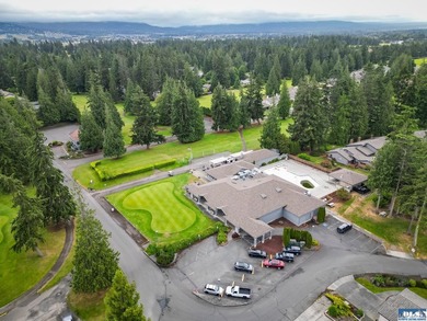 Panoramic golf-course views anchor this light-filled two-story - photo 18