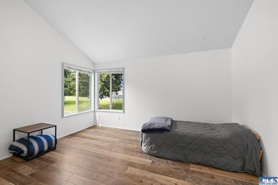 Panoramic golf-course views anchor this light-filled two-story - photo 19
