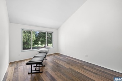 Panoramic golf-course views anchor this light-filled two-story - photo 20