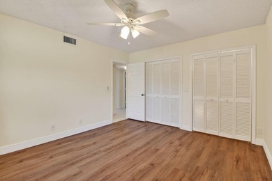 Beautifully maintained 1st floor condominium with extended water - photo 25