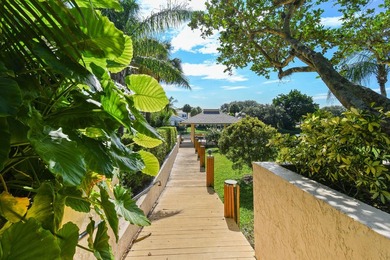 Beautifully maintained 1st floor condominium with extended water - photo 29