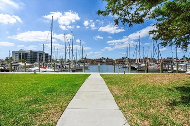 Experience the ultimate in marina-front living in this - photo 5