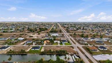 Clear lot on a freshwater canal in growing NW Cape Coral - photo 4