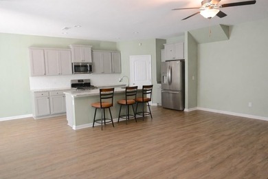 Welcome to this stunning 4-bedroom, 3-bath home designed for - photo 5