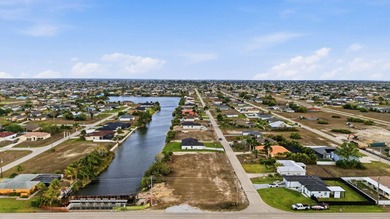 Clear lot on a freshwater canal in growing NW Cape Coral - photo 5