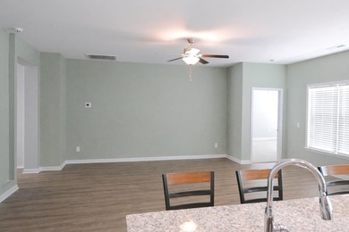 Welcome to this stunning 4-bedroom, 3-bath home designed for - photo 8