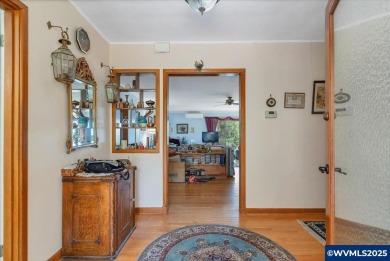 Spacious, one level mid-century rambler, offering 2500+ SF w/ 3