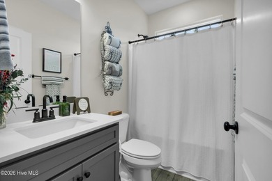 Nearly new 3BR/2BA coastal home blending modern comfort with - photo 17