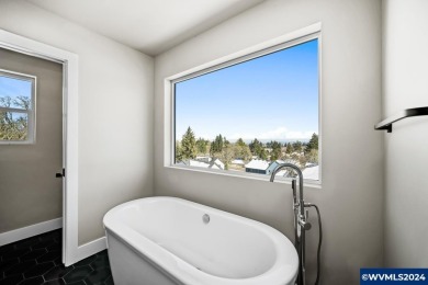 To be built by Celtic Homes (CCB #200095). Daylight basement