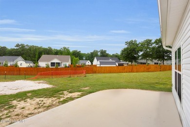 Nearly new 3BR/2BA coastal home blending modern comfort with - photo 19