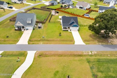 Nearly new 3BR/2BA coastal home blending modern comfort with - photo 25