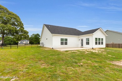 Nearly new 3BR/2BA coastal home blending modern comfort with - photo 30